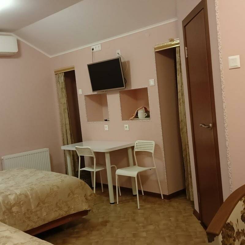 Фотографии номера Двухместный комфорт с 2 односпальными кроватями в Гостинице Энергия Батайск